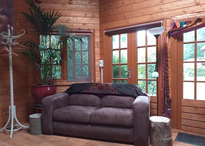 Bed & Breakfast De Geheime Tuin - Boshuis 4*